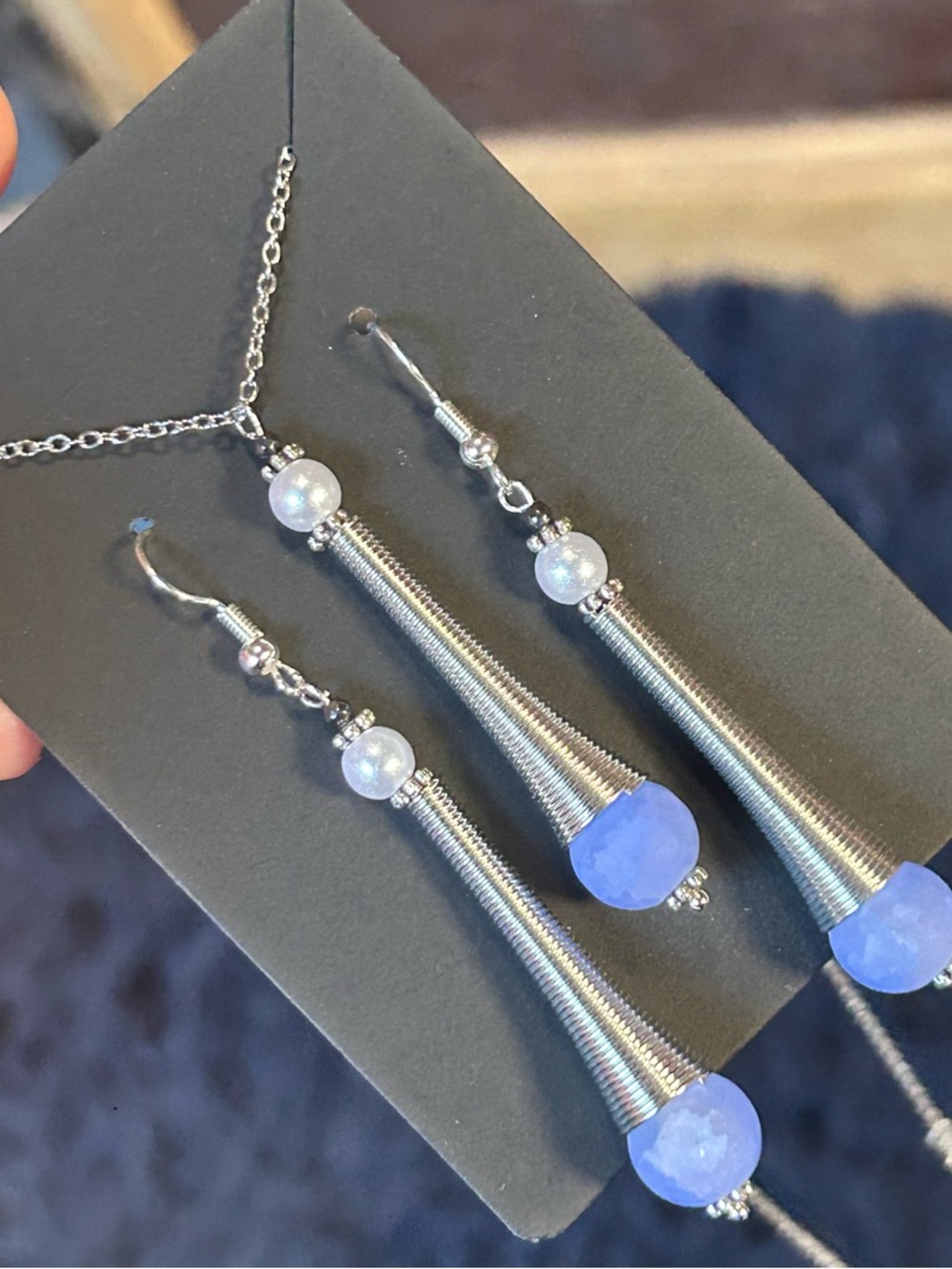 Handcrafted periwinkle crackle glass silver coil necklace and earring set